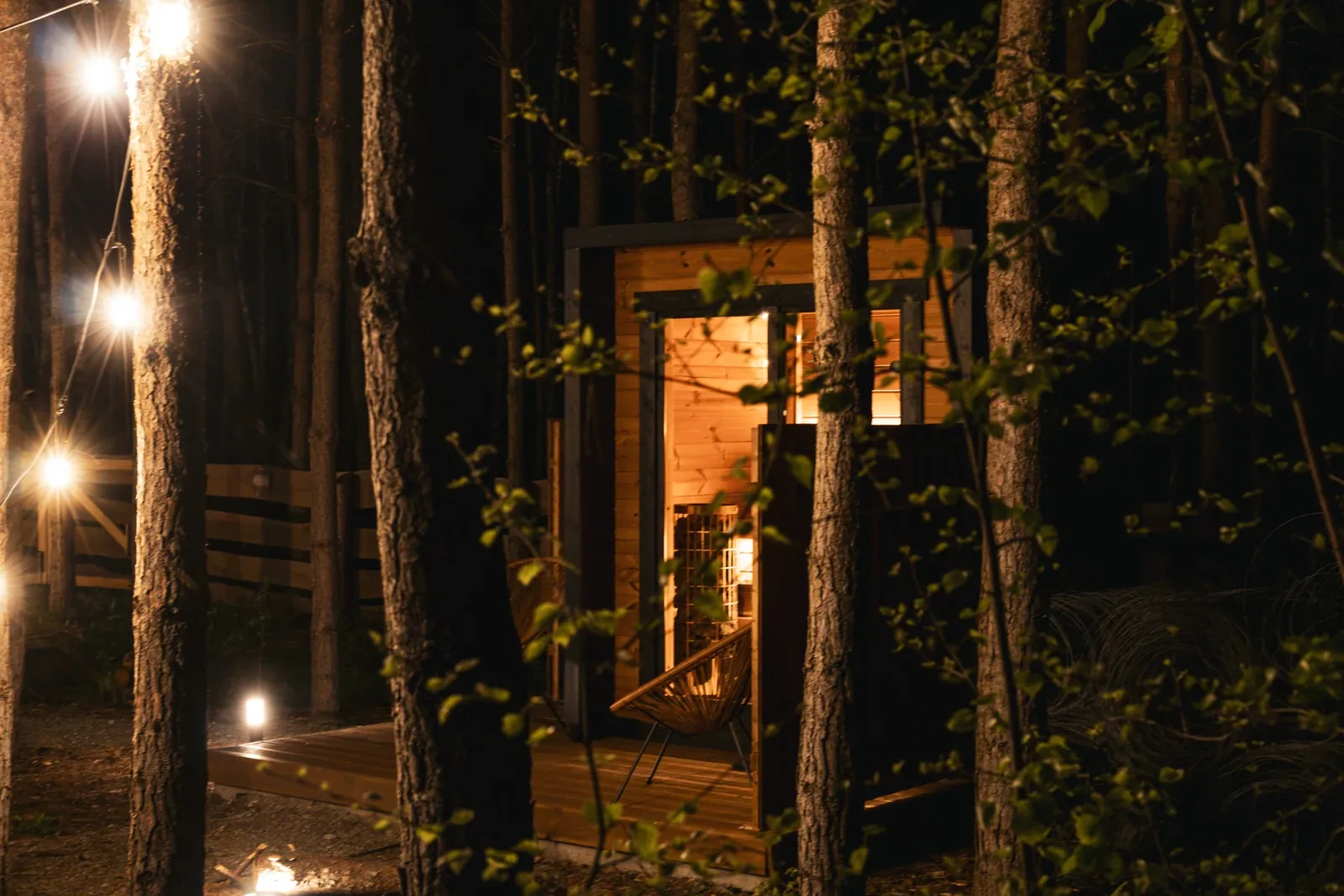 Evening lights beside a cabin