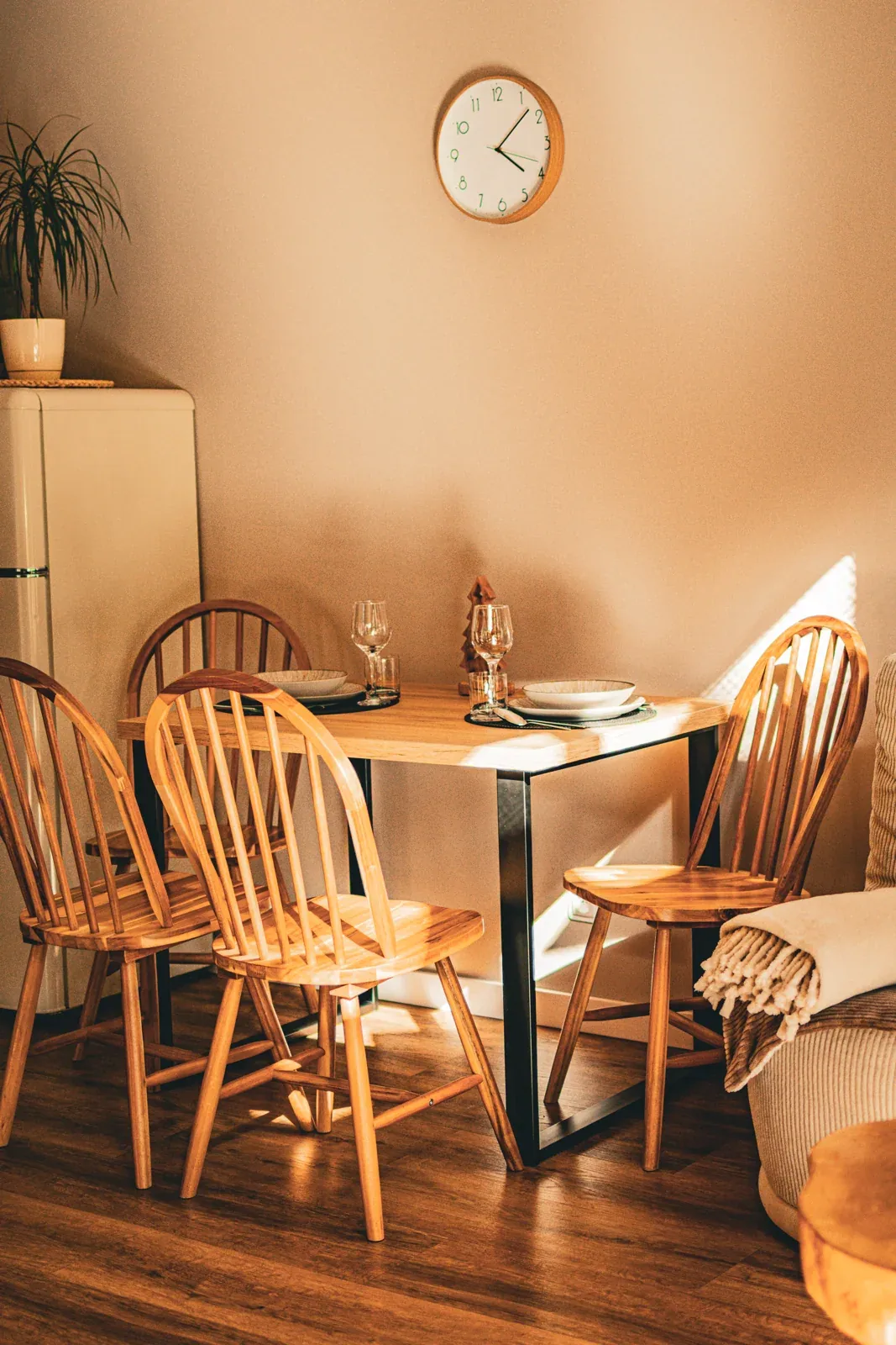 A laid table beside the kitchen
