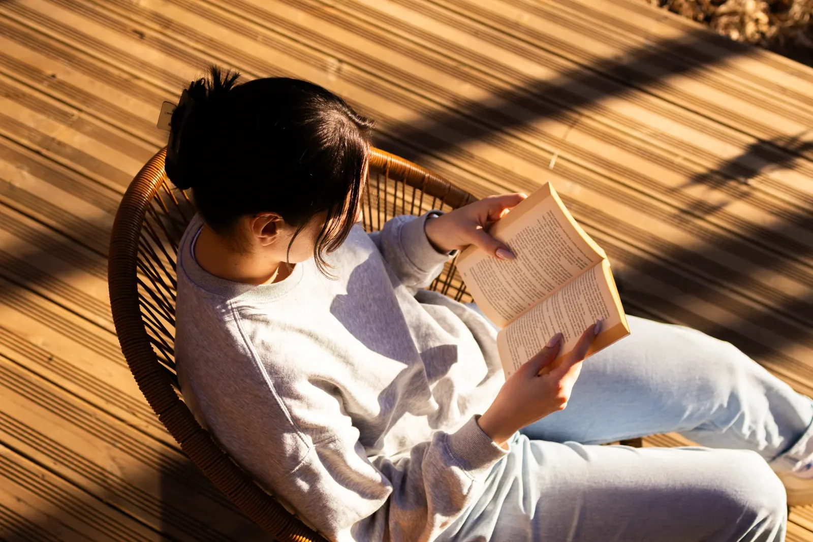 A book on a sunny terrace