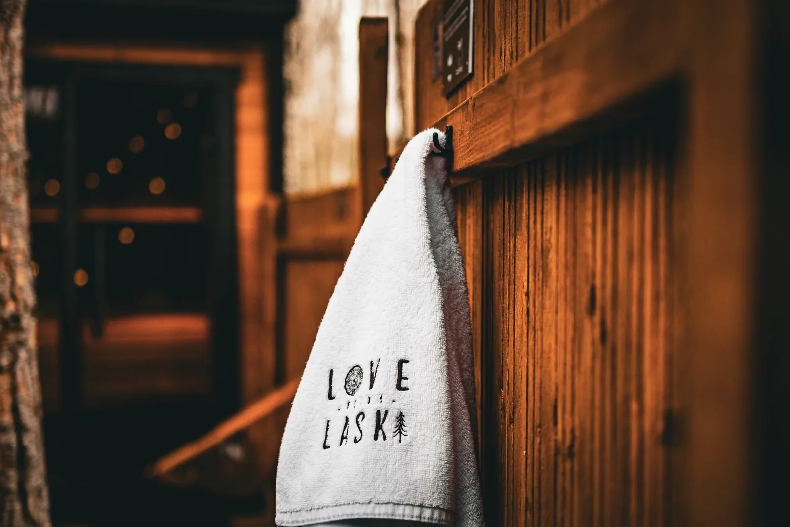 A LoveLaski bathrobe beside the spa