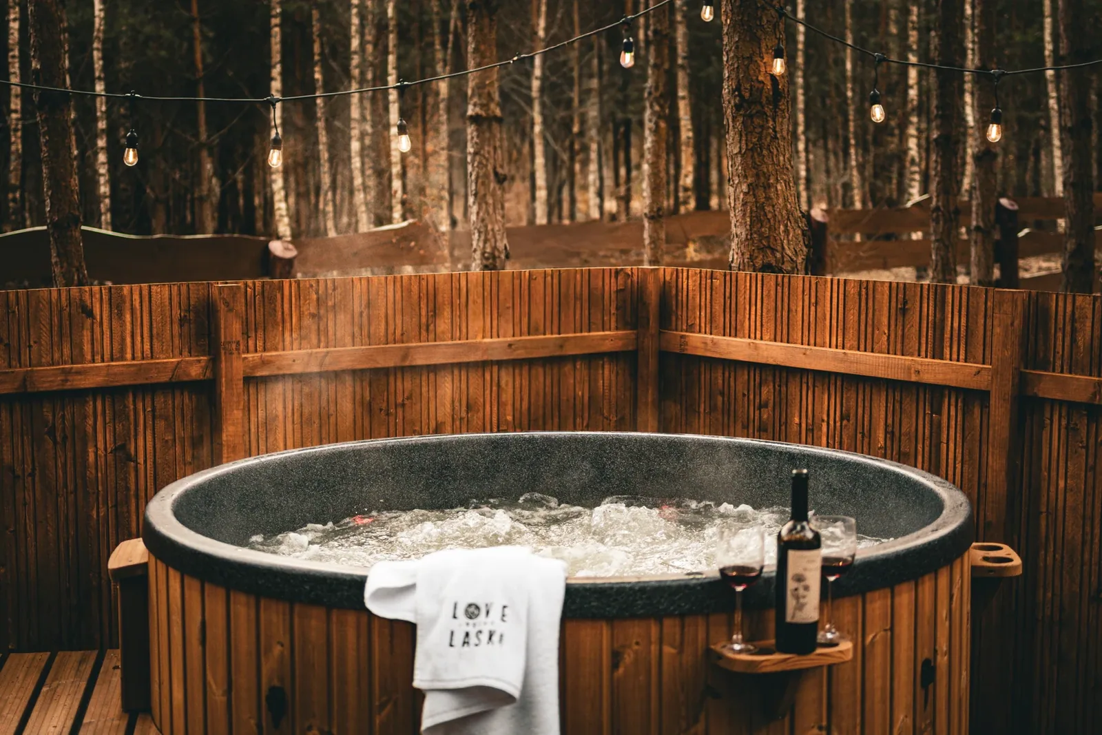 The hot tub in the evening with bathrobes ready