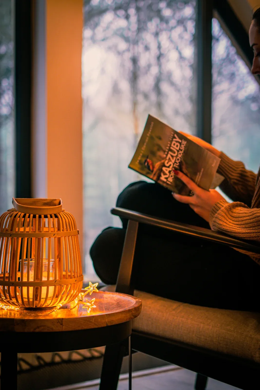 A book beside a lantern on the mezzanine