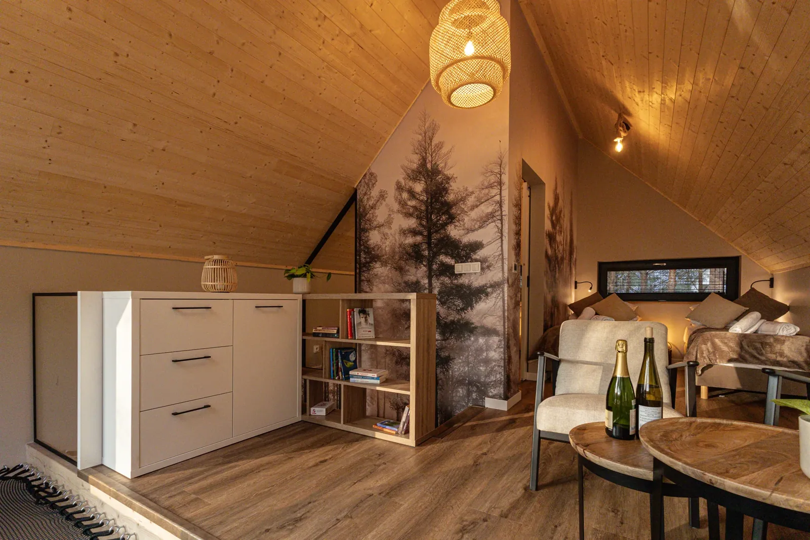 The mezzanine beneath the sloping wooden roof