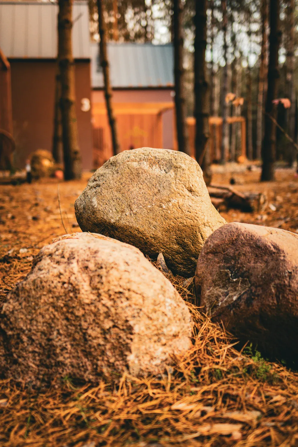 Boulders beside a cabin