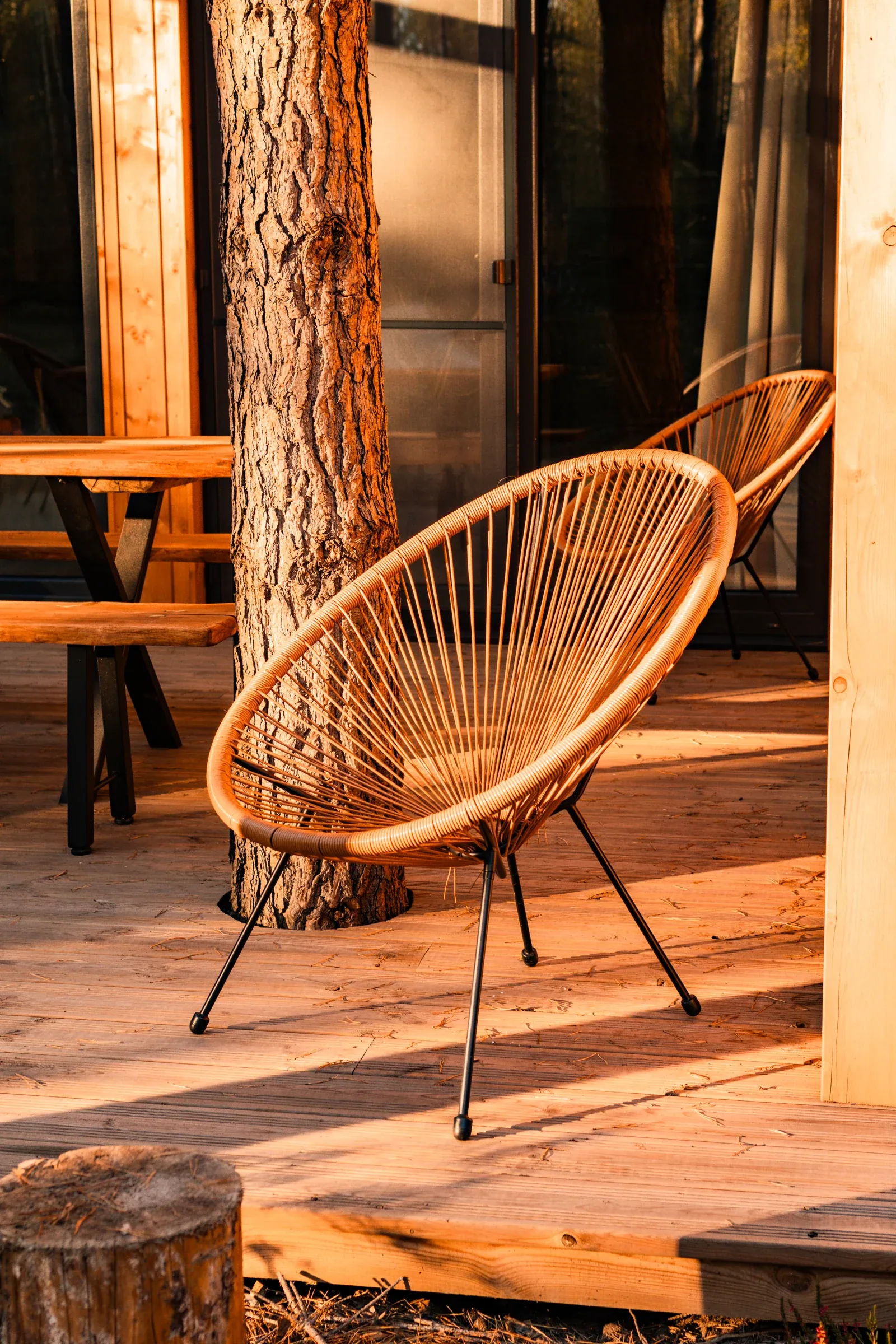 A rattan armchair on the terrace